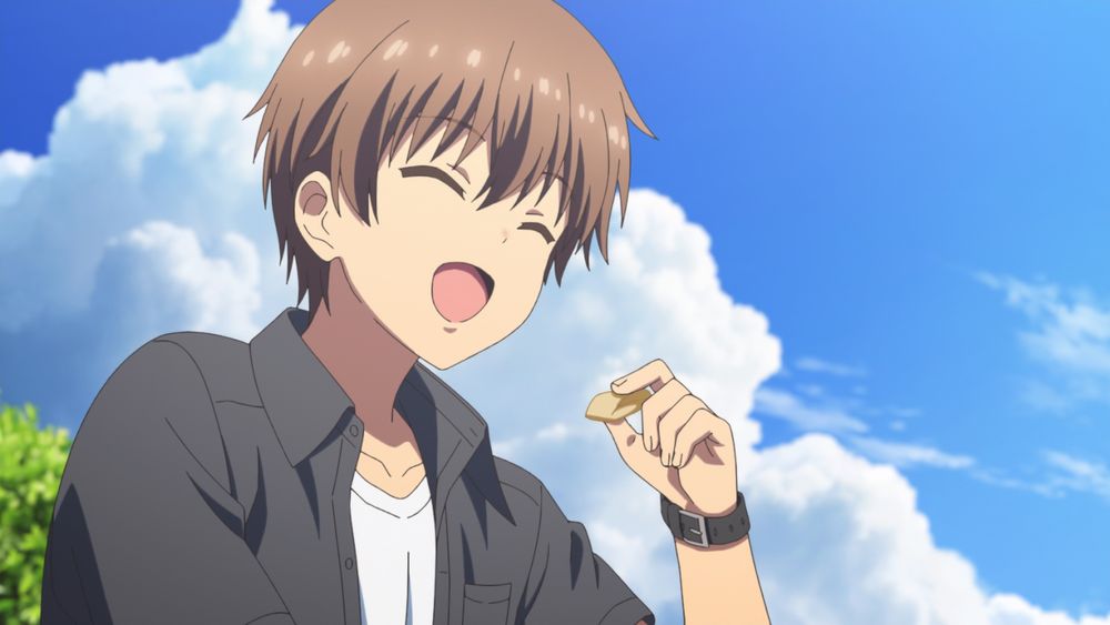 He then proceeds to tear off a piece of the crepe and put it in his mouth, rather than biting it off