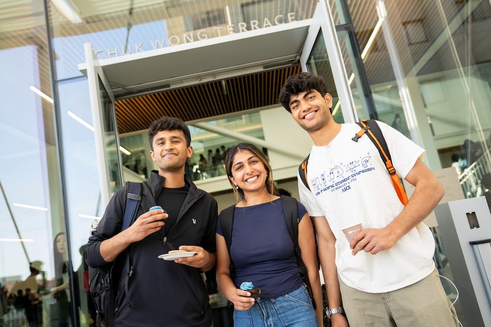 Three attendees pose in front of the Chuk Wong Terrace entrance. (Photo by Adam Lau/Berkeley Engineering)
