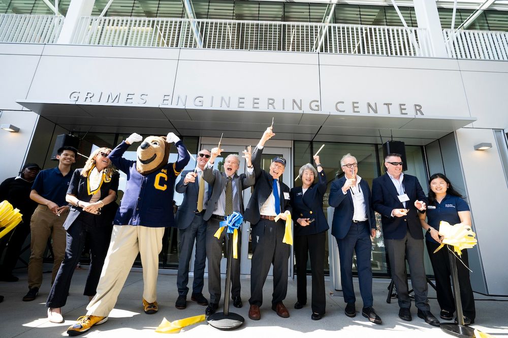 From left: student Ryan Kuo, B.S. ‘26 EECS & MSE, Co-President, Engineering Student Council; Janelle Grimes; Oski Bear; alumnus Michael Grimes, B.S. ’87 EECS; Chancellor Rich Lyons; alumnus Eugene Jarvis; College of Engineering Dean Tsu-Jae King Liu; SOM architect Michael Duncan, XL Construction Senior VP Craig Ellis; and student Vivian Chung, B.S. ‘25 BioE & MSE; cut a ribbon during the Grimes Engineering Center opening celebration. (Photo by Adam Lau/Berkeley Engineering)