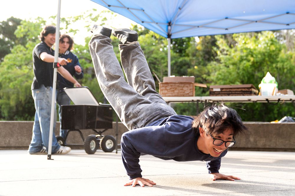 One attendee performs a breakdance move. (Photo by Adam Lau / Berkeley Engineering)