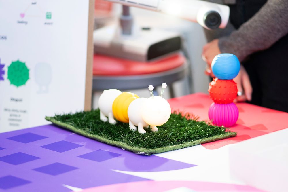 “The storytelling caterpillar” figurine on a synthetic grass mat. (Photo by Adam Lau / Berkeley Engineering)