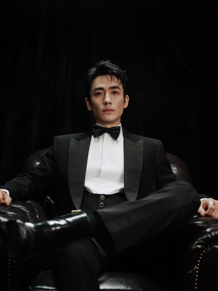 Zhu Yilong dressed to the nines and looking as dom as fuck.