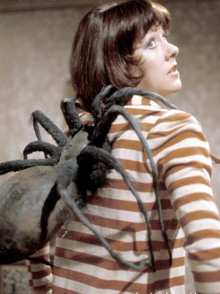 Sarah Jane with a big spider from Metebelis 3 on her back 