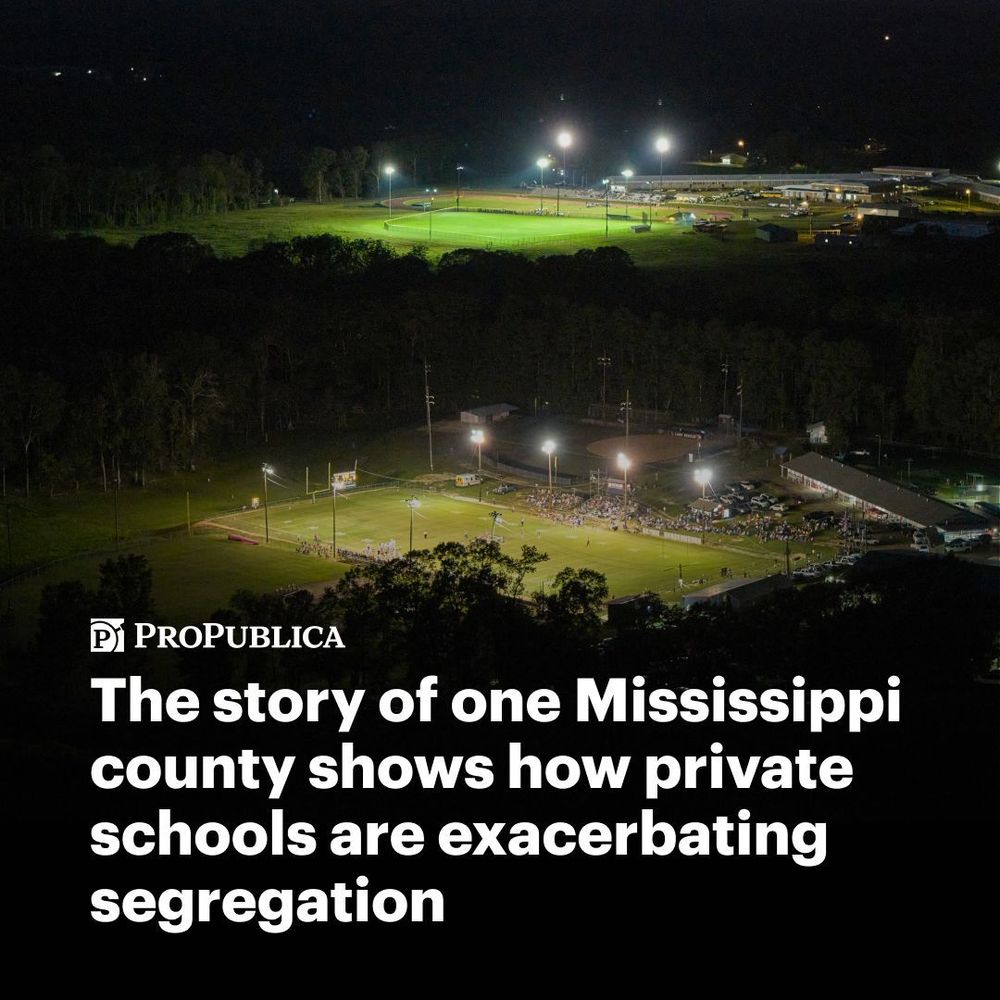 Text: The story of one Mississippi county shows how private schools are exacerbating segregation. Image: Nighttime views of two Amite County, Mississippi high school football fields in close proximity.
