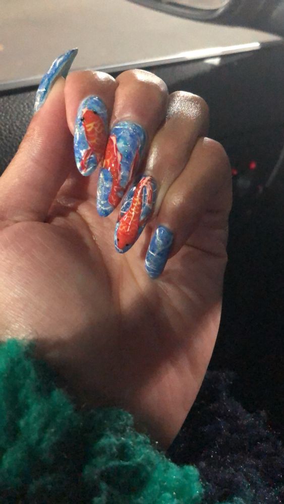 Nailfie. Long natural nails. Hand painted with koi. 
