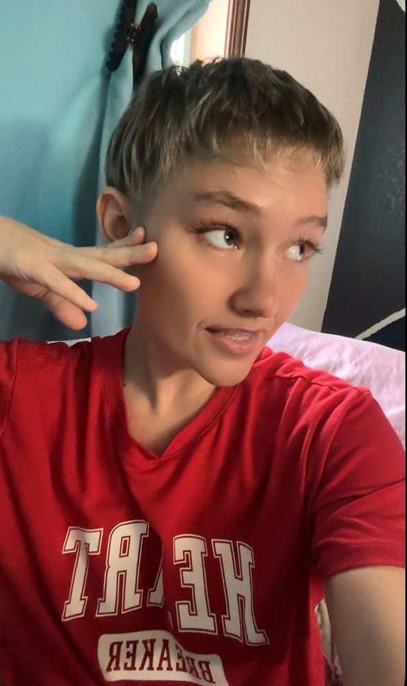 Raven with short pixie cut hair