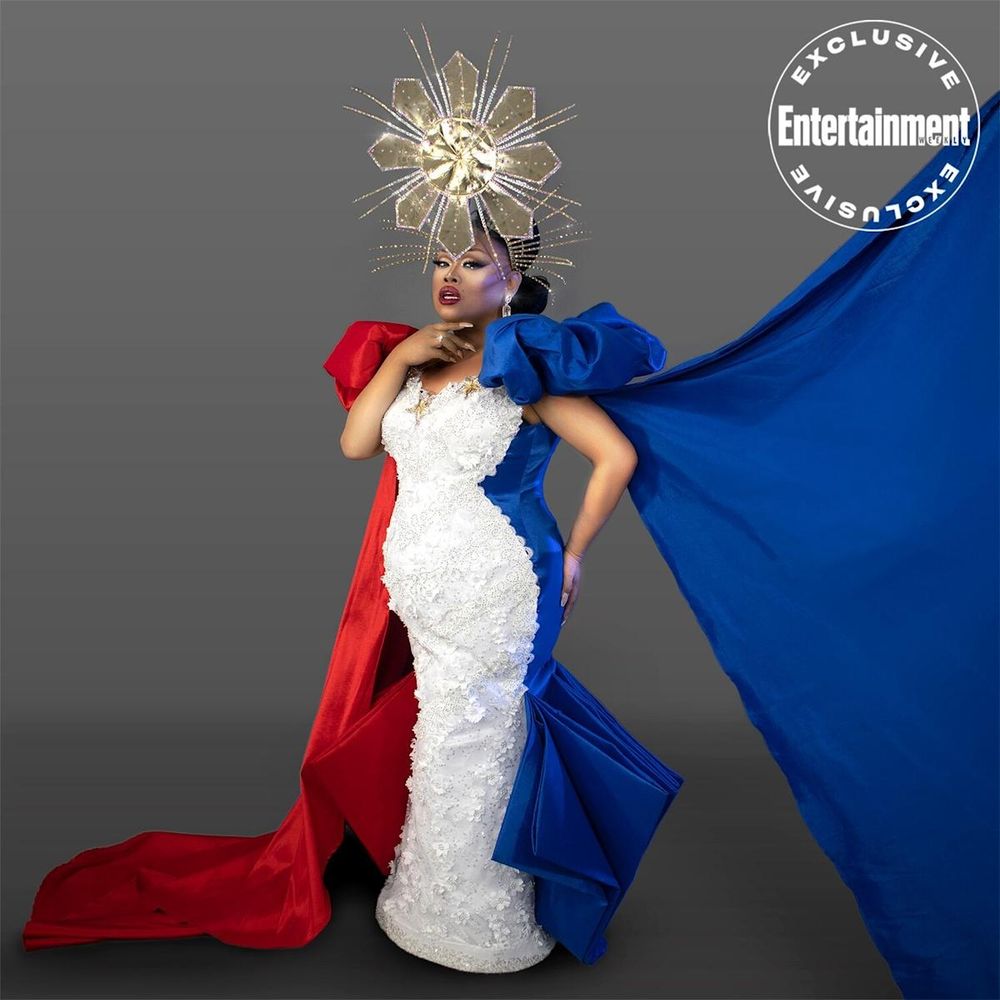Jiggly wearing the colours of the flag of the Philippines. this photo was used in Entrainment Weekly. the gown is designed by Joshuan Aponte. she wears a magnificent golden headpiece that references the star of the philippines