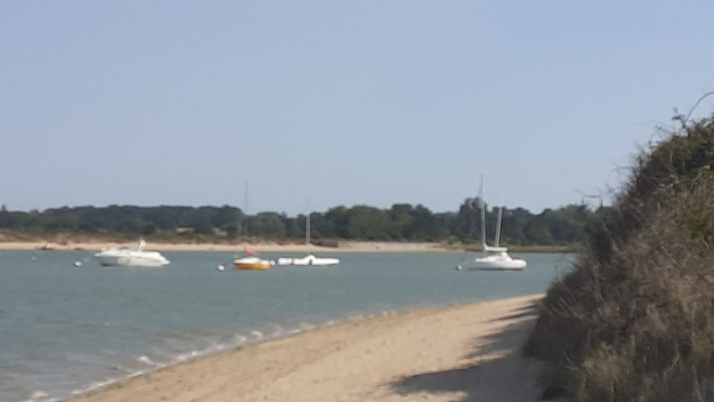The beach at the point where the Orne flows into the Channel 