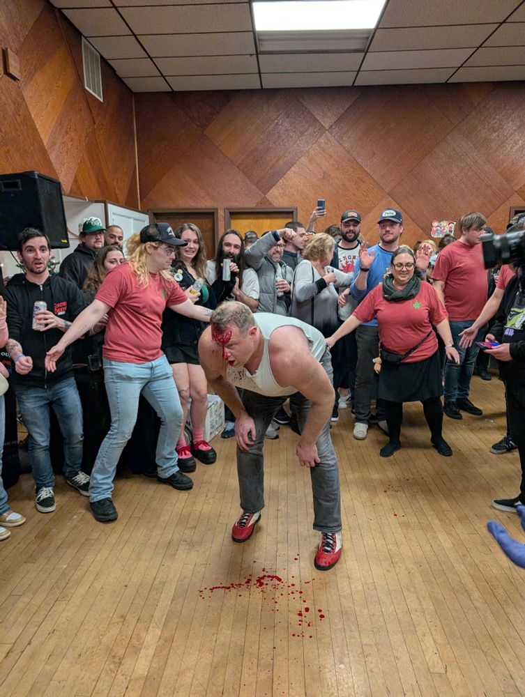 Dan Champion bleeding on the floor.