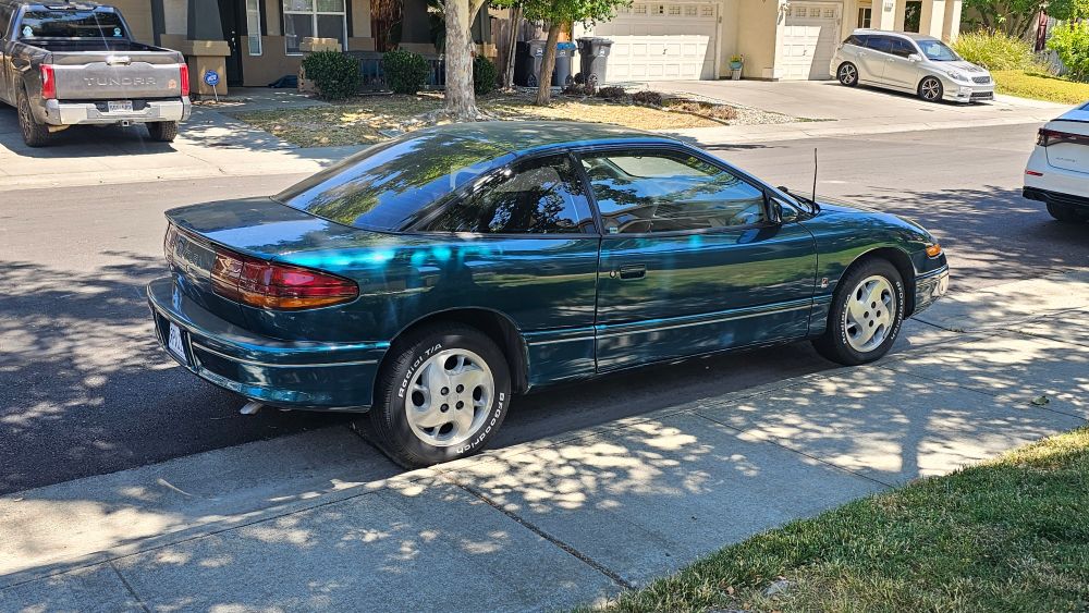 Passenger side of Saturn SC. 