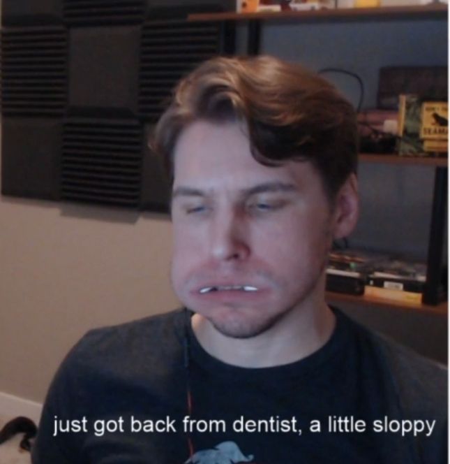 jerma looking down, with gauze in his mouth. the text in front of him says "just got back from the dentist, a little sloppy"