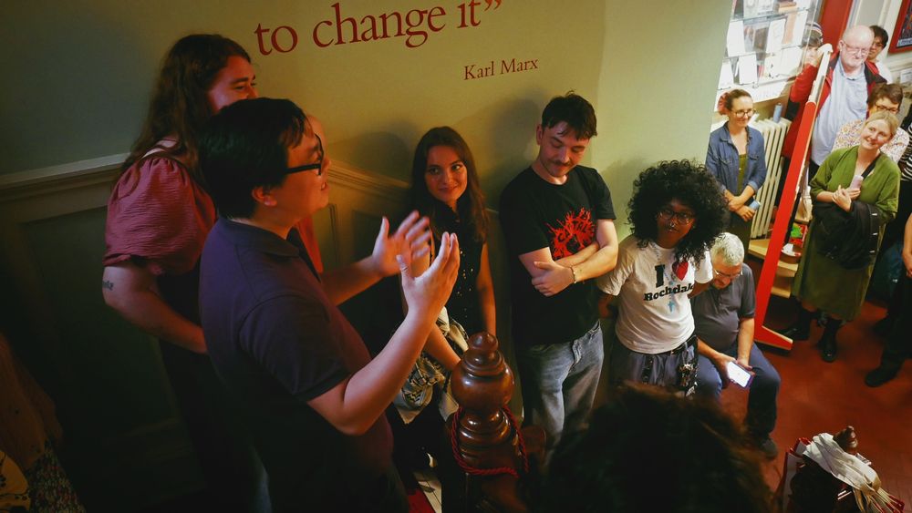 The Little Flames group give their speeches to the audience on the Library’s staircase.