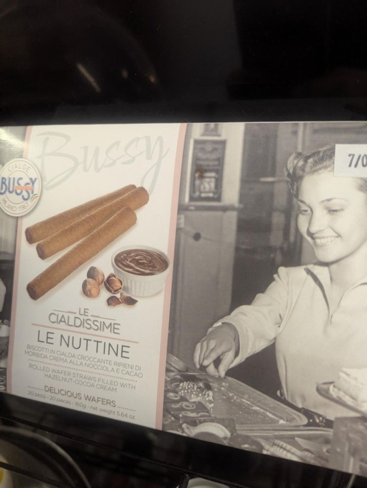 A box of italian cookies labeled "BUSSY" not once but twice, non-ironically. Also "LE NUTTINE." 