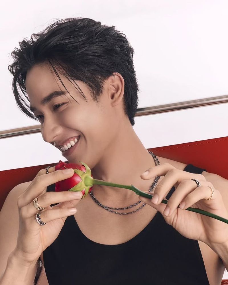 Tay fingering a rose (no, a literal rose)