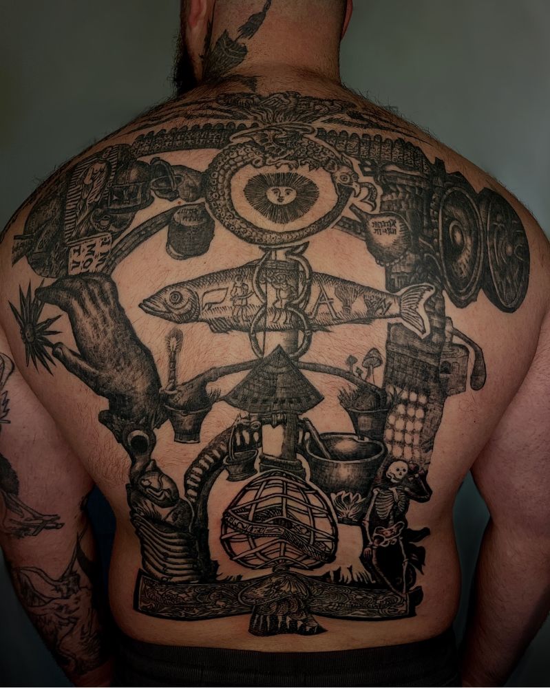 A large back tattoo made up of collaged medieval illustrations and etchings