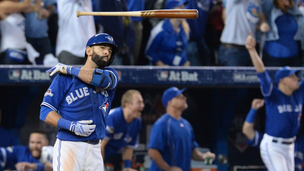 Jose Bautista throws his bat away after destroying the pathetic Texas Rangers.