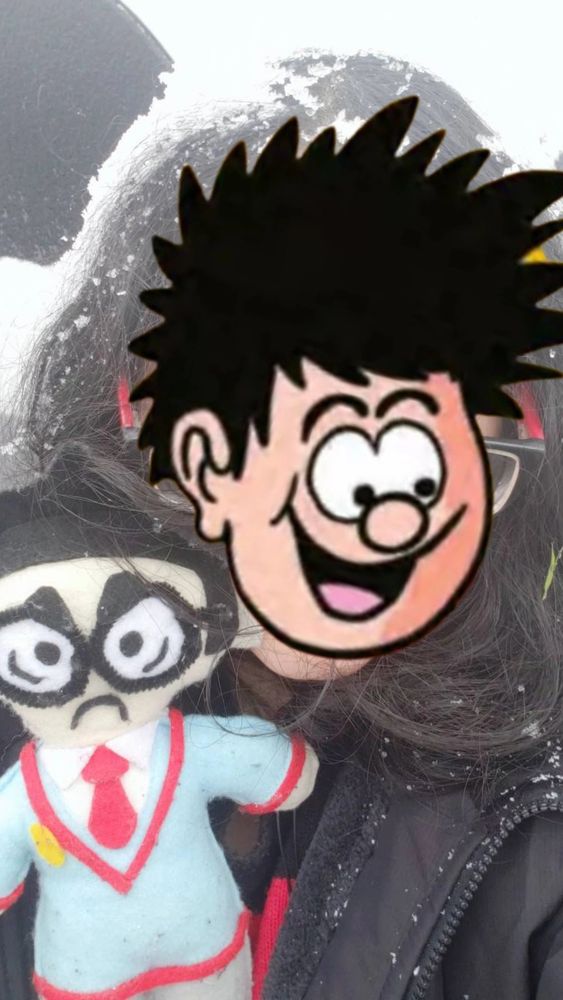 A picture of Dennis (that's me), and his Walter doll during their first snow day.