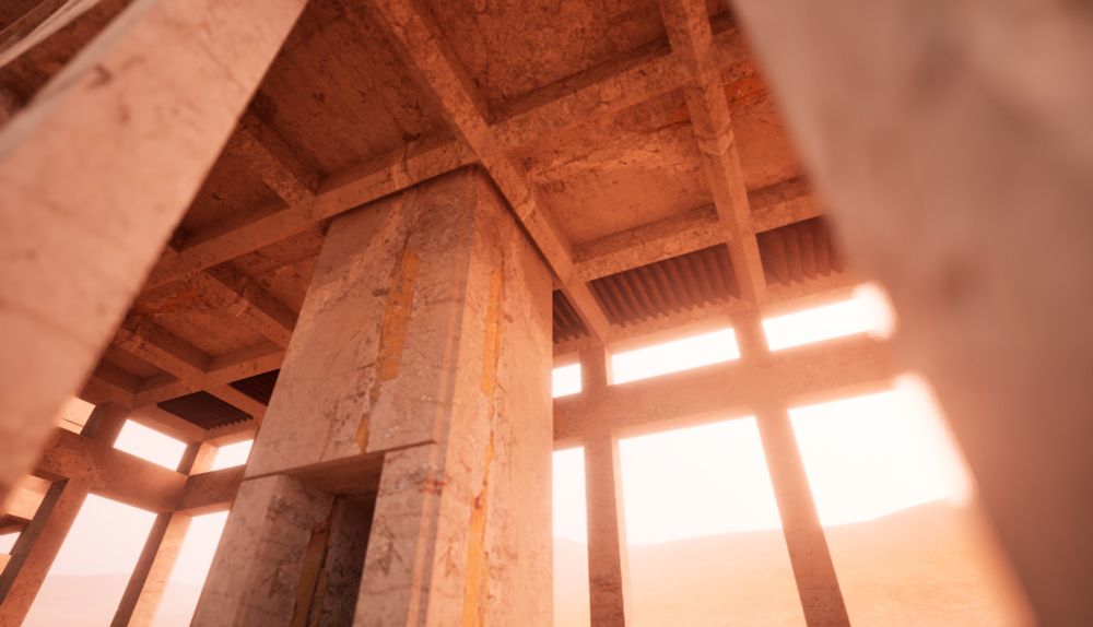 under a building held up by concrete columns