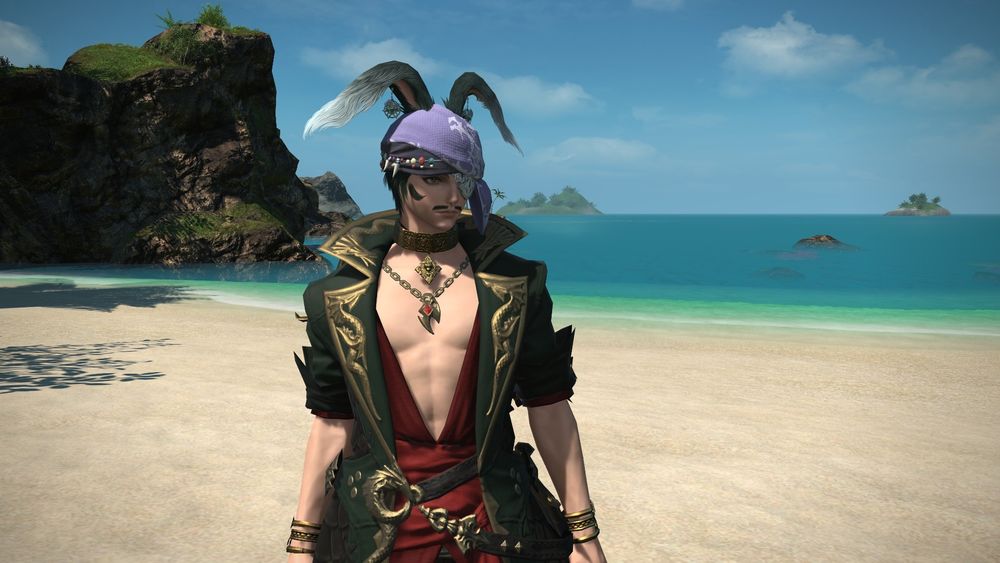 August the viera standing on beach in pirates coat bandana and eyepatch
