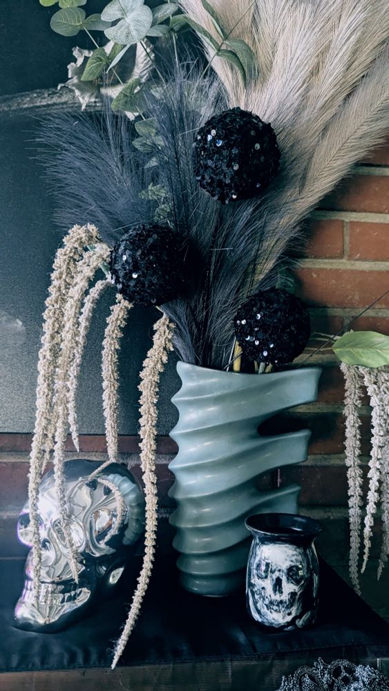 Halloween decorations with dark floral arrangement