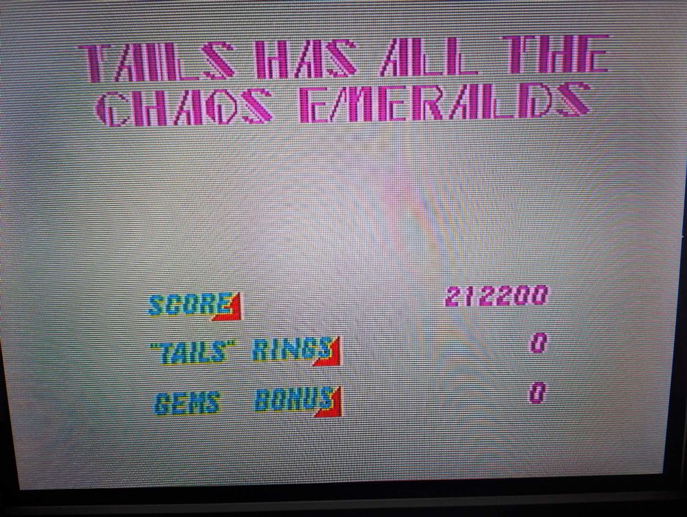 Tails has all the Chaos Emeralds but they're invisible cause sprite flickering 