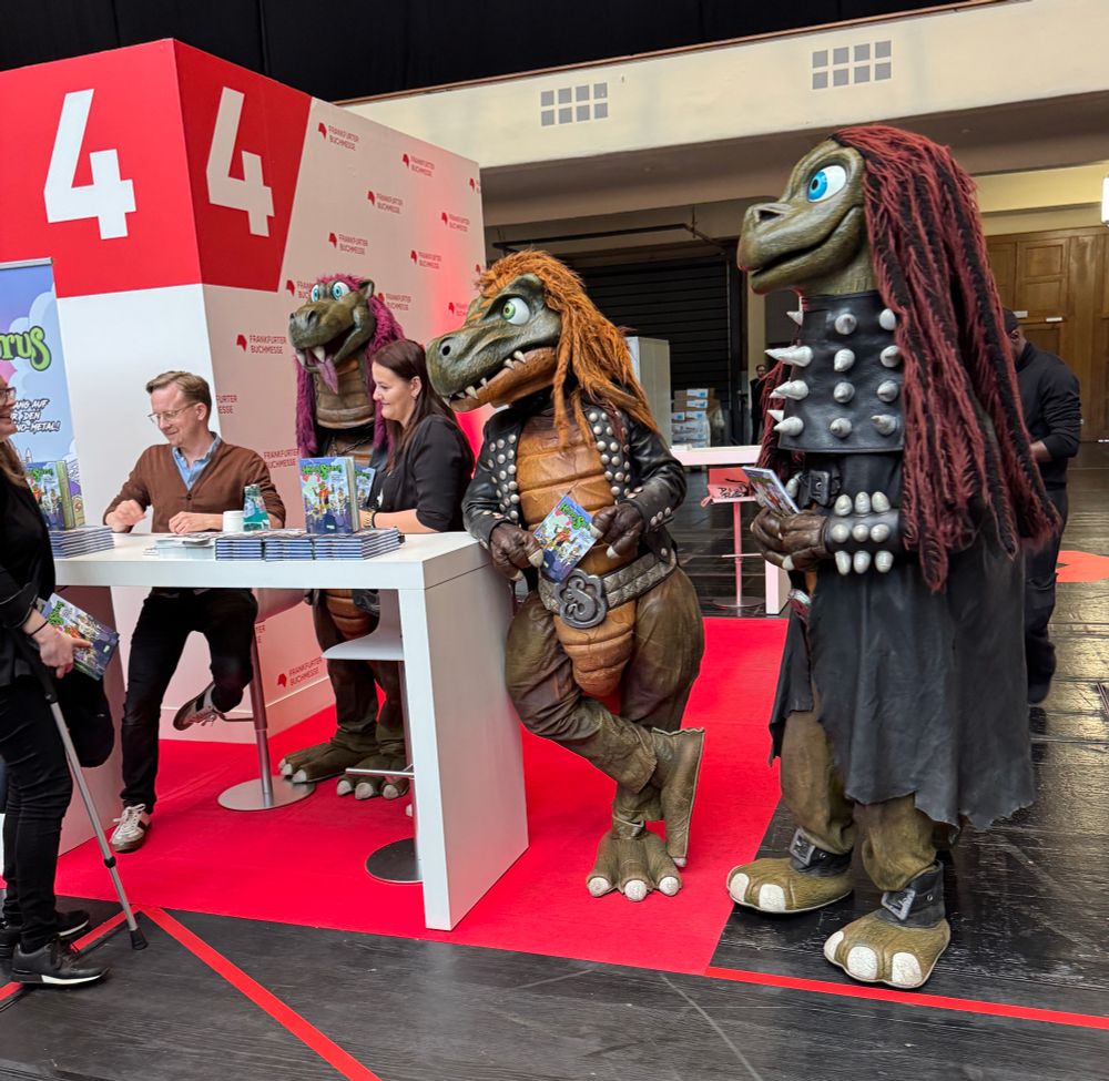 Me signing comics with Heavysaurus 