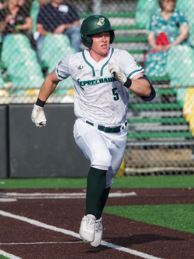 Batter turned base runner sprinting to first base