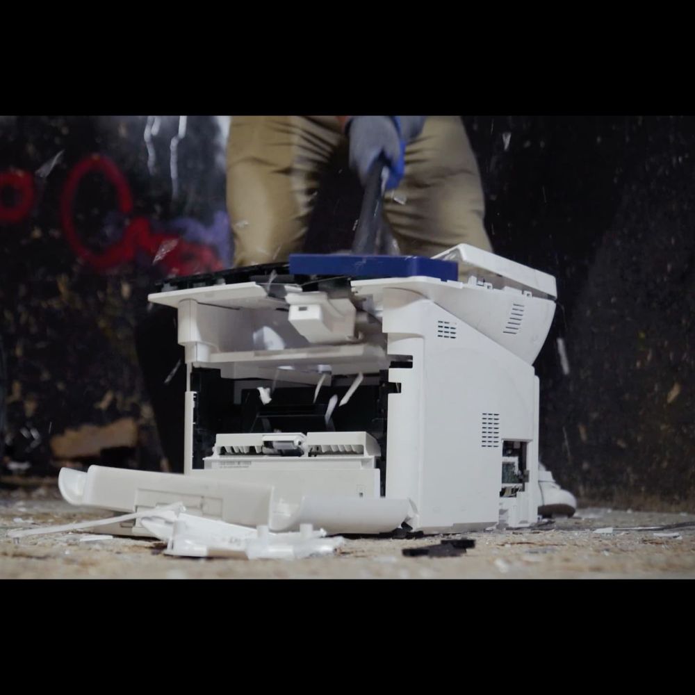 People are paying to break printers with sledgehammers in smash rooms