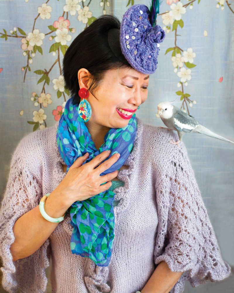Terri is pictured with her bird, Snowball, for Ari Seth Cohen's "Advanced Pets" book.