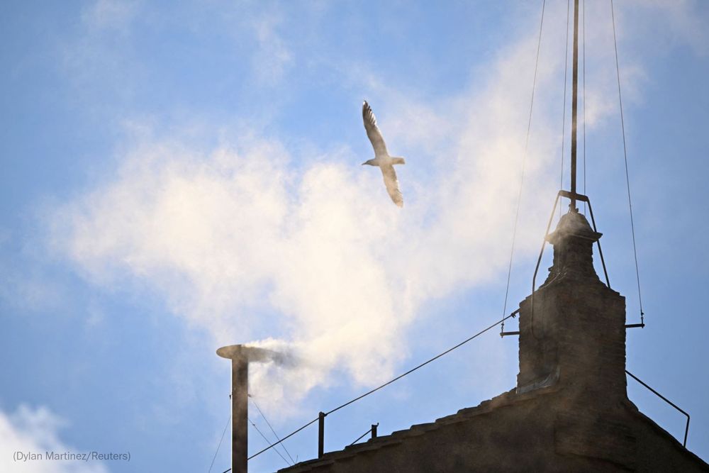 White smoke rises from the chimney on the Sistine Chapel, indicating that a new pope has been elected at the Vatican, May 8, 2025. Photo by Dylan Martinez for Reuters.