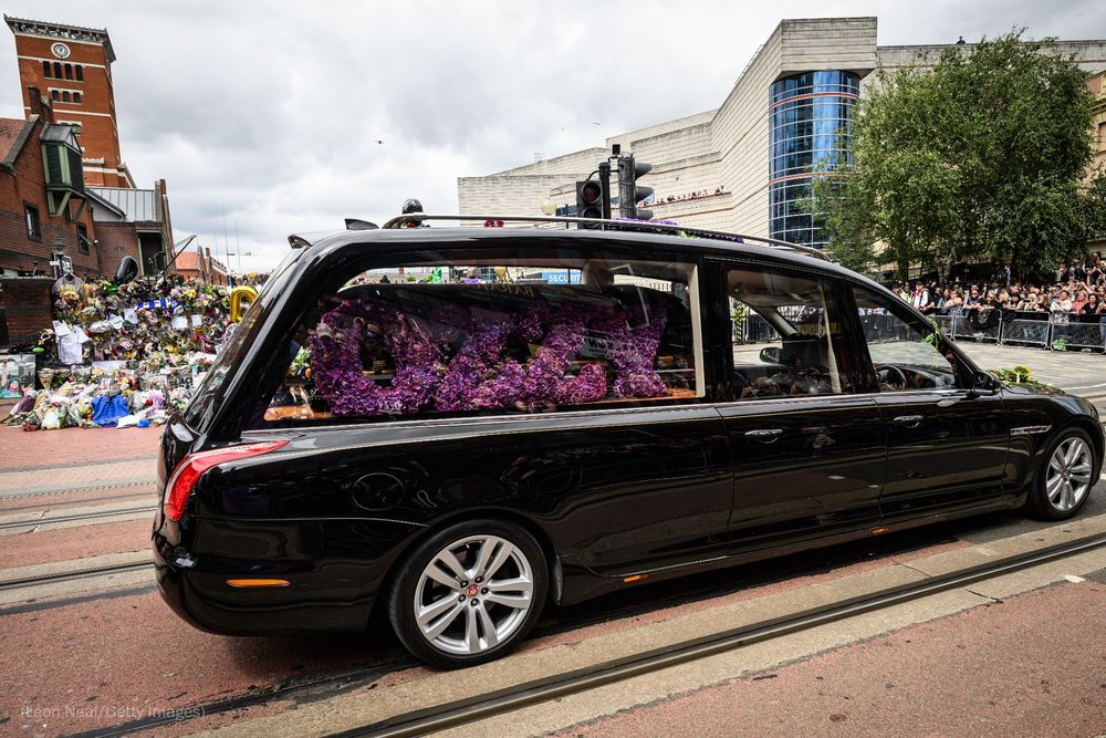 A hearse carrying the late Ozzy Osbourne arrives at Black Sabbath Bridge as his funeral cortege travels through his home city of Birmingham.