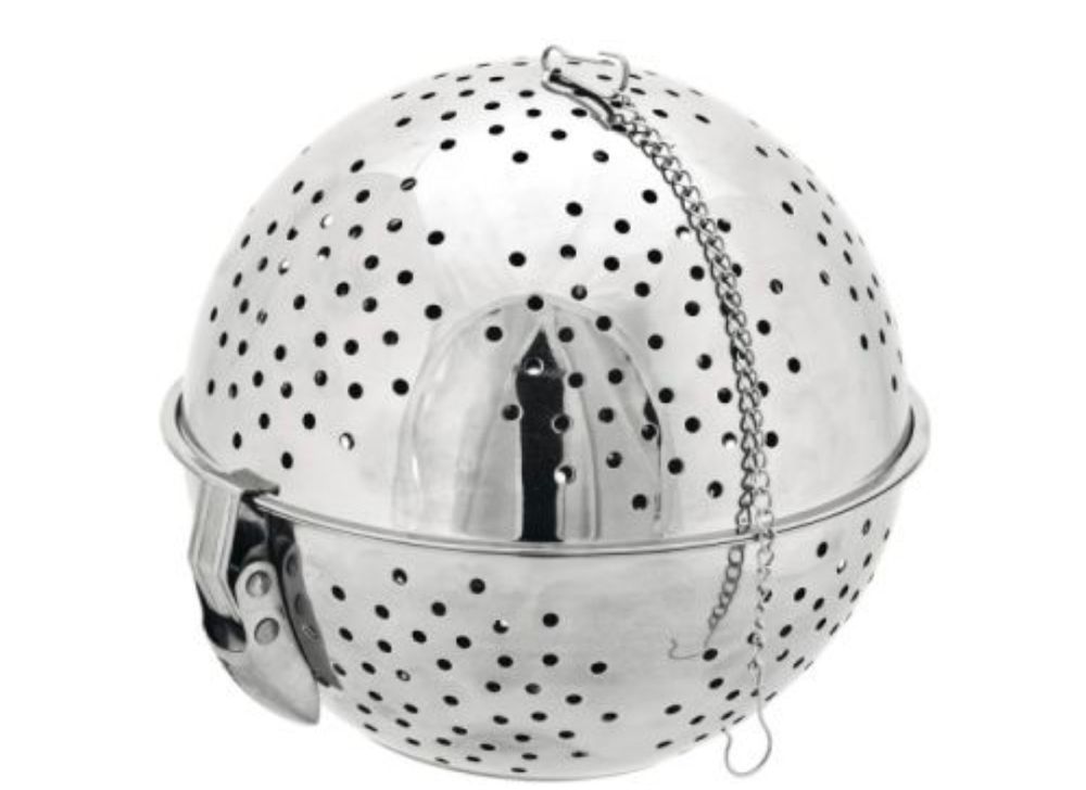 Bola em inox com buracos para cozer arroz, legumes, também chamada panela de ossos