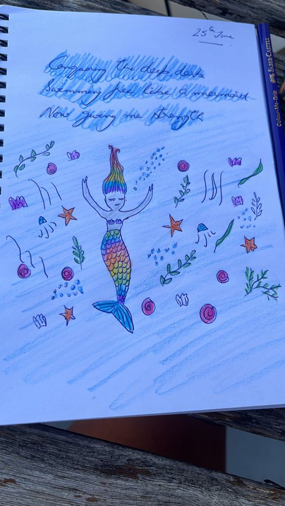 A Haiku written by me: Conquering the deep dark, swimming free like a mermaid, now giving me strength. And a doodle of a meditating mermaid. 