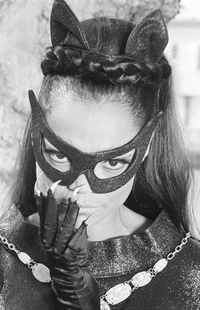 A close-up, black and white photo of Eartha Kitt in her Catwoman costume.