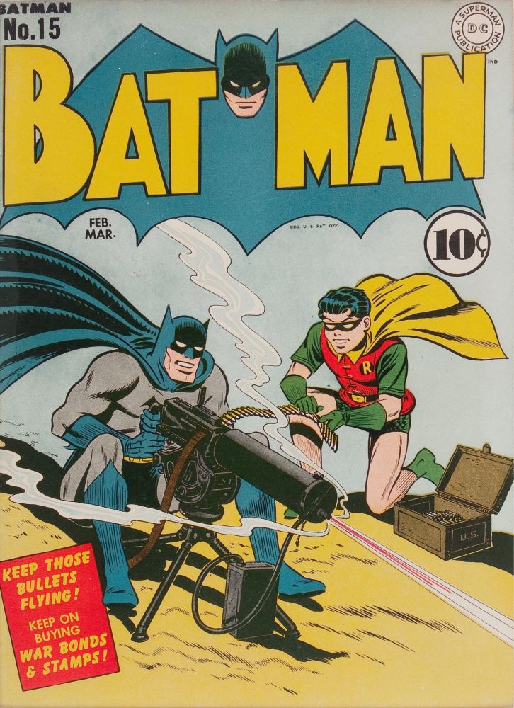 Batman #15 (1943). On the cover, Batman is firing a large machine gun while Robin feeds more ammunition into it.