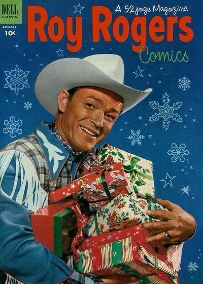 Roy Rogers #61 (1953). A photo of Roy holding a bunch of Christmas presents with snowflakes drawn into the background.