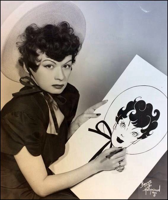 Parker drawing a self-portait. Or it could also be Mopsy since they look so much alike.