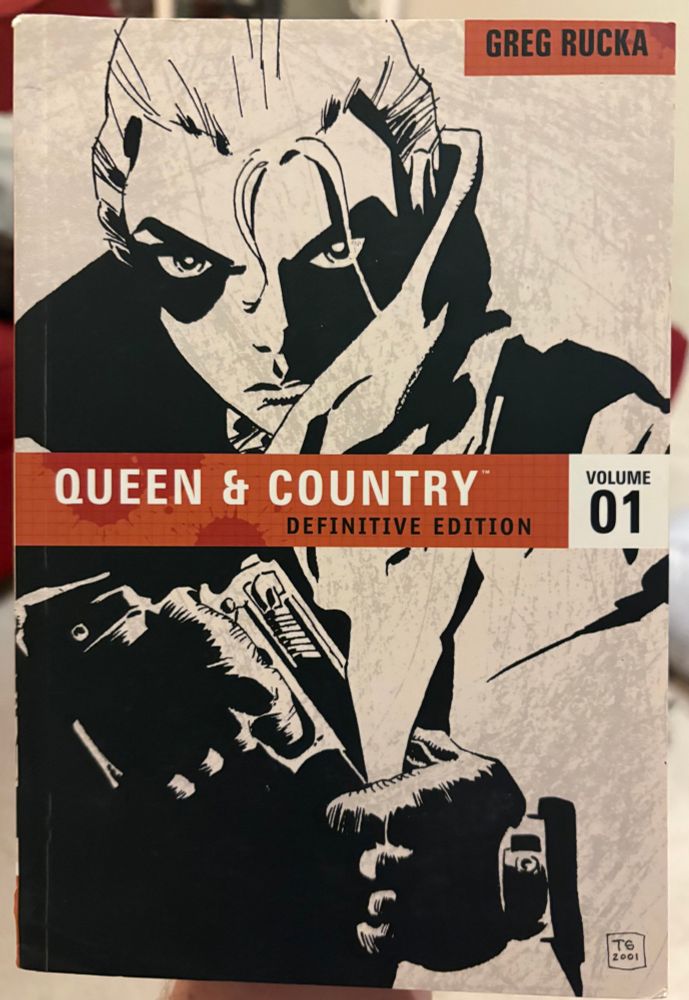 The first volume of "Queen & Country: The Definitive Edition" by Greg Rucka.