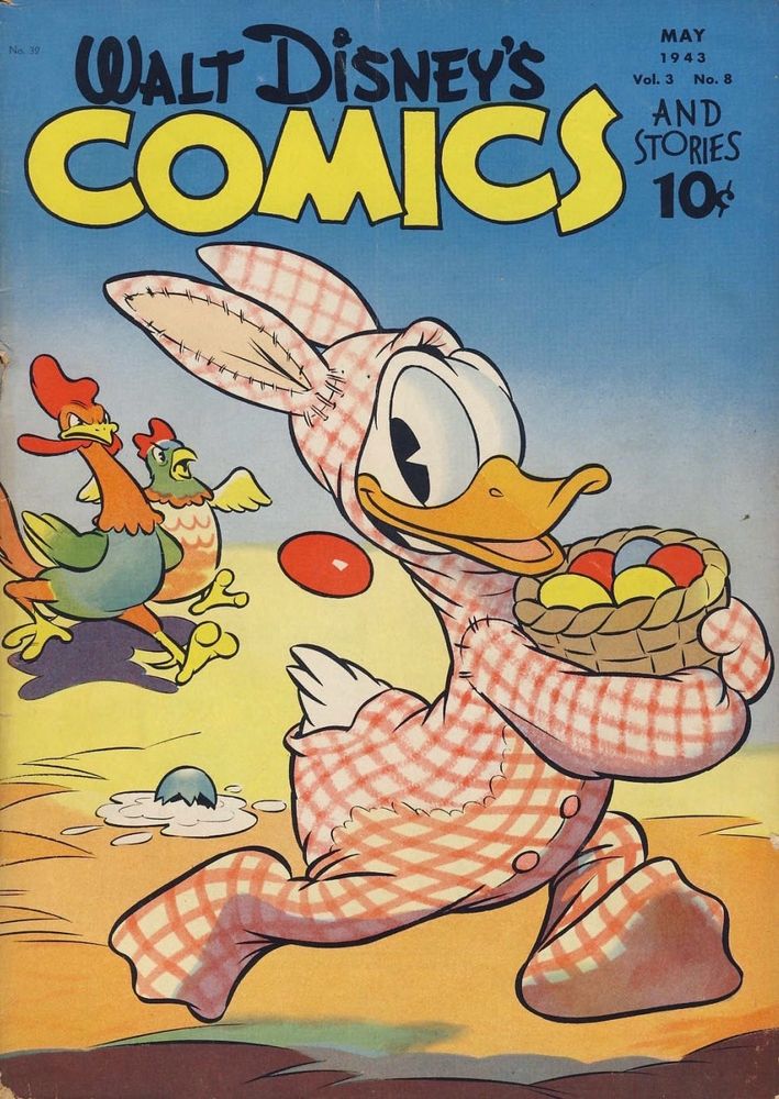 Walt Disney’s Comics and Stories #32 (1943). On the cover, Donald Duck is wearing an Easter Bunny costume and running while holding a basket of decorated eggs. He is being chased by a rooster and a hen.