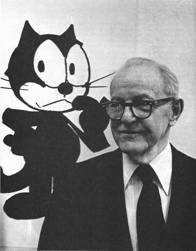 A black and white photo of Messmer with a drawing of Felix behind him.