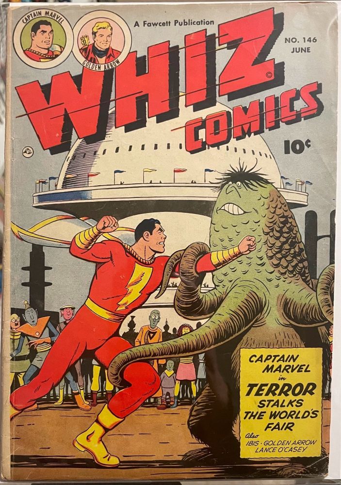 Whiz Comics #146 (1952). "Captain Marvel in Terror Stalks the World’s Fair.” Cap is fighting a wonderfully bizarre green alien with an oval body, scales, a small bit of black hair on his head, tiny eyes, big teeth, and at least three tentacles.