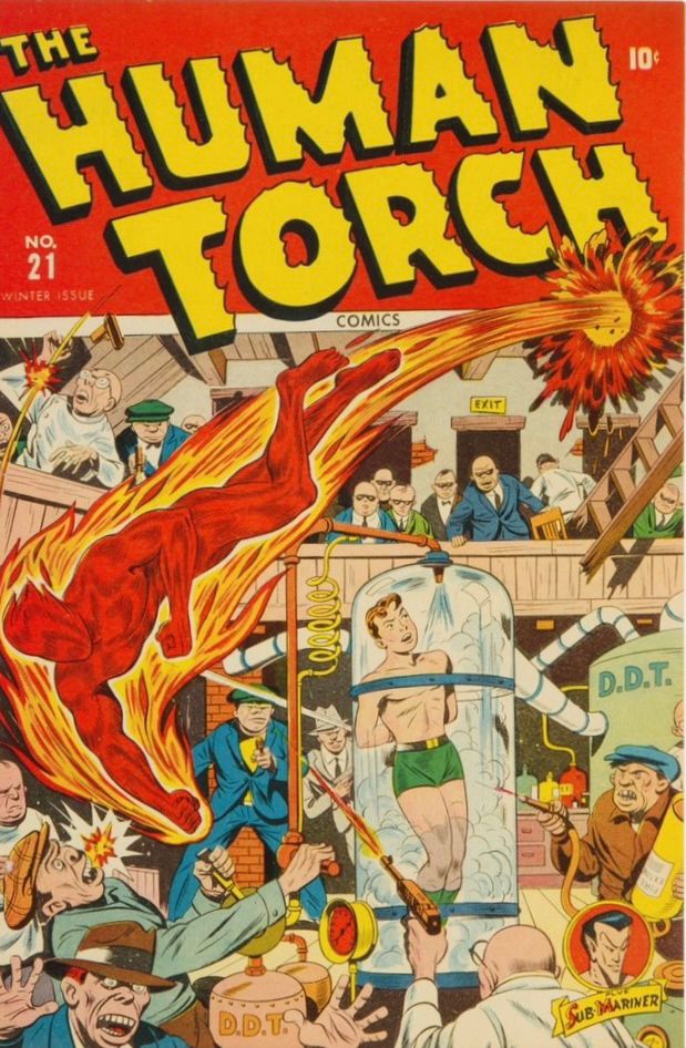 The Human Torch #21 (1945). The cover shows the Human Torch busting through the ceiling of a factory or warehouse, where Toro is being held by a bunch of bad guys. Toro is in a large, clear tank, and it's hooked up to several containers of DDT, which the appear to be spraying Toro with. One of the bad guys is shooting at the Torch, and another is spraying the Torch with something. Some of the bad guys are watching the scene while others are fleeing.