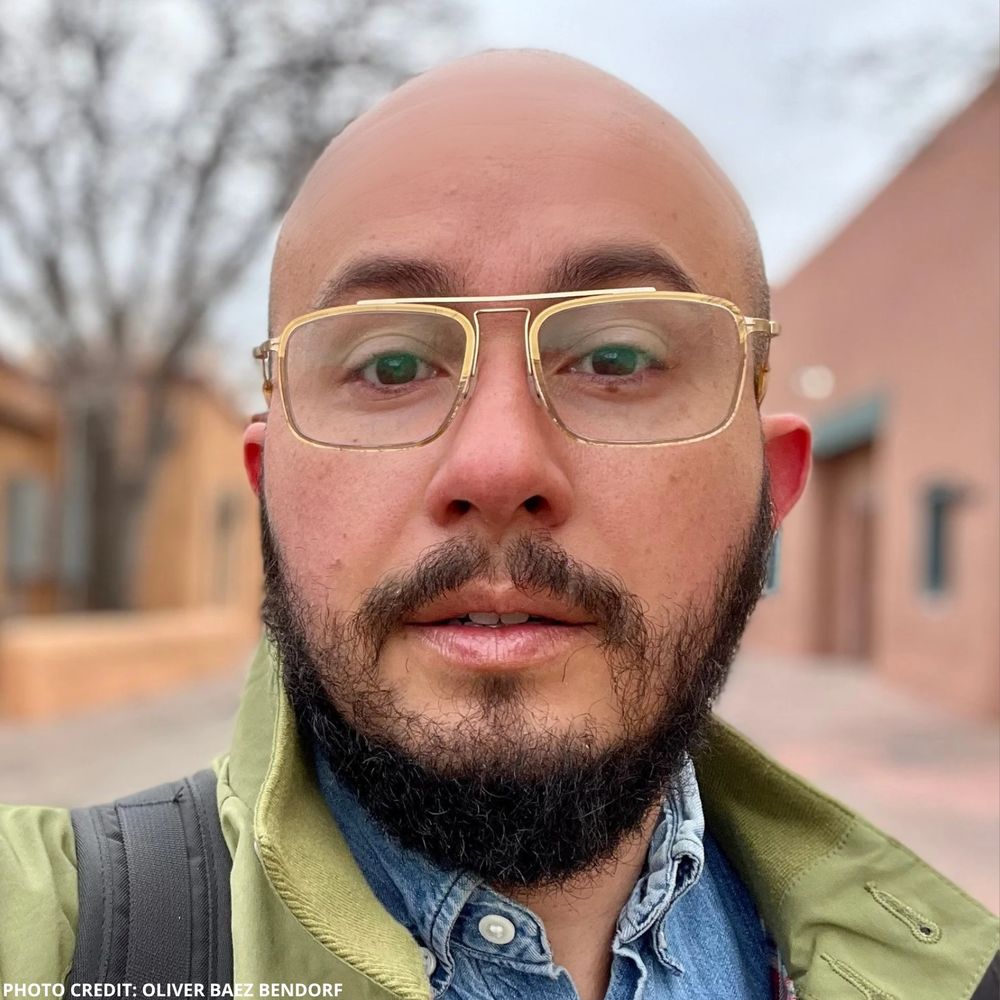 A headshot of Oliver Baez Bendorf 