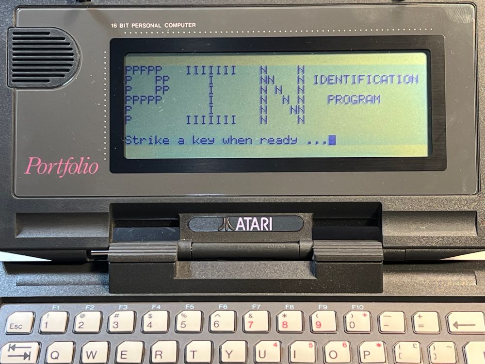An Atari Portfolio showing the infamous "PIN IDENTIFICATION" program from Terminator 2.