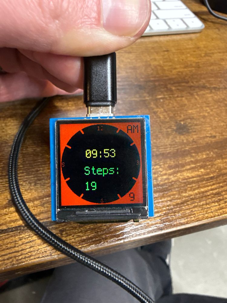 RP Watchy display showing 19 steps taken as calculated by the LSM6DSV on the watch board.