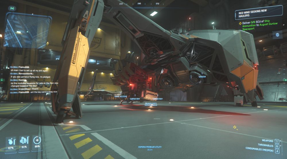 Screenshot from Star Citizen. A Prowler Utility with its side doors open, full of cargo. It's wings are swept down to form landing struts.