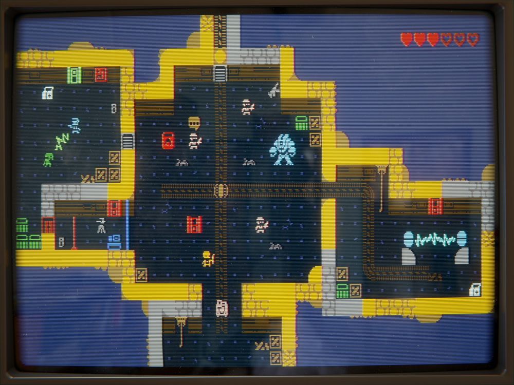 A 3D render that shows what looks like a vintage CRT display, with an image of a very "retro" looking, low resolution rogue-like demake of Half-Life.