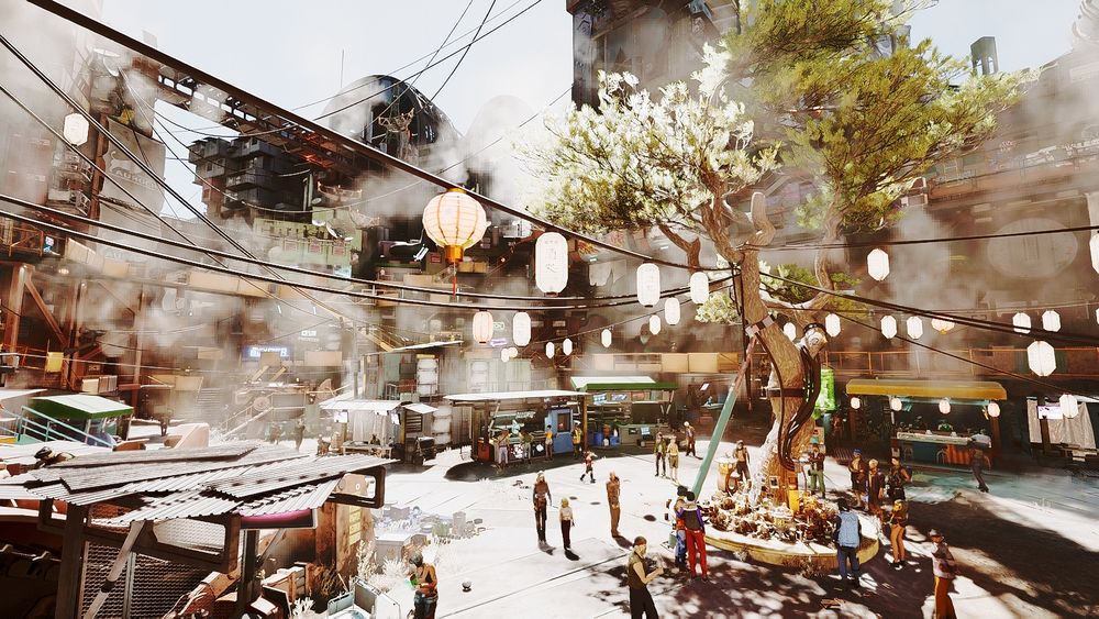 Screenshot de Cyberpunk 2077 dans Dogtown:

Un arbre est planté au milieu de la placette, il sert de monument aux morts, des guirlandes de lampions asiatiques relient l'arbre aux bâtiments qui l'entoure, des gens se recueillent, on aperçoit des commerces dans des paillottes en tôles autour de la place et des immeubles et bâtiments futuristes en fond