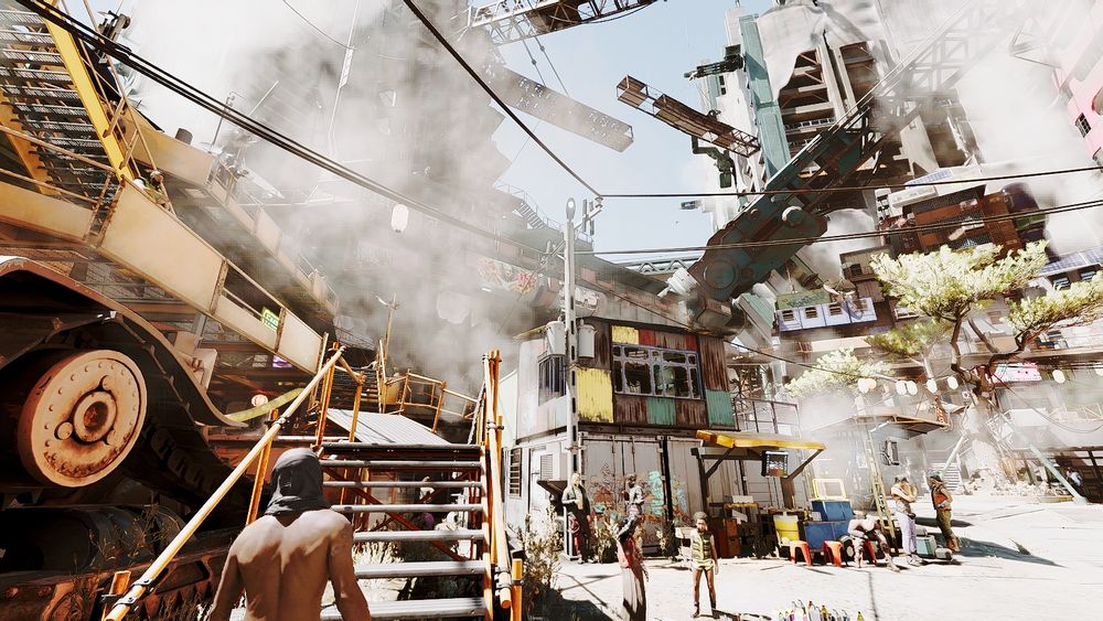 Screenshot de Cyberpunk 2077 dans Dogtown:

autre point de vue avec de la fumée et des nuages de sables, des enfants jouent au milieu des déchets