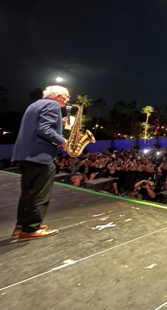 Bernie Sanders on stage at Coachella with a poorly superimposed saxophone 